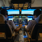 Pilots training in full flight simulator